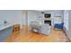 Spacious living room boasts hardwood floors and an open floor plan to the kitchen at 1202 Foxfield Rd, Waxhaw, NC 28173