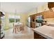 Eat-in kitchen with tile floors, ample counter space, and lots of natural light at 124 Neumann Run, Belmont, NC 28012