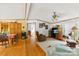 Cozy living room featuring hardwood floors and a comfortable seating area with wood trim at 124 Neumann Run, Belmont, NC 28012