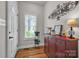 Welcoming entryway with hardwood floors, decorative accents, and ample natural light at 15 Willow Oaks Ct, Taylorsville, NC 28681