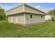 Exterior side view of the building with a grass lawn, and multiple entrance doors at 15 Willow Oaks Ct, Taylorsville, NC 28681
