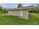 Exterior shot of the building with a well-maintained lawn and multiple doors at 15 Willow Oaks Ct, Taylorsville, NC 28681