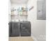 Laundry room with shelving, washer, and dryer at 15 Willow Oaks Ct, Taylorsville, NC 28681