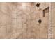 Close up of a neutral tiled walk in shower with built-in bench at 15 Willow Oaks Ct, Taylorsville, NC 28681