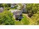 Aerial view of the home showcasing its backyard, patio, and surrounding landscaping at 15002 Strathmoor Dr, Charlotte, NC 28277