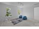 Bright bedroom with table and chairs plus 2 bean bag chairs at 15002 Strathmoor Dr, Charlotte, NC 28277
