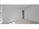 Neutral bedroom with door to closet at 15002 Strathmoor Dr, Charlotte, NC 28277