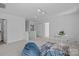 Bright bedroom with two bean bag chairs and table with chairs at 15002 Strathmoor Dr, Charlotte, NC 28277