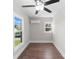 Well-lit bedroom featuring hardwood floors, dual windows, and neutral paint at 155 Jackson Rd, Salisbury, NC 28146