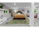 Carpeted bedroom with accent lighting, artwork, and neutral tones at 155 Jackson Rd, Salisbury, NC 28146