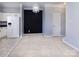 Bright open area with a blend of living and dining features, white appliances, carpeted floors, and modern lighting at 1716 Termini Dr, Charlotte, NC 28262