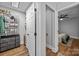 A glimpse into the bedroom from the walk-in closet, showcasing the ample storage and thoughtful layout at 1913 Garibaldi Ave, Charlotte, NC 28208
