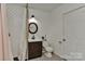 Updated bathroom with subway tile shower, modern vanity, and neutral color palette at 1944 Garibaldi Ave, Charlotte, NC 28208