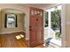 Inviting entryway with a view into a room with hardwood floors at 1944 Garibaldi Ave, Charlotte, NC 28208