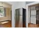 Spacious kitchen with stainless steel refrigerator and laundry area at 1944 Garibaldi Ave, Charlotte, NC 28208