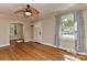 Living room featuring hardwood floors, a ceiling fan, and neutral walls at 1944 Garibaldi Ave, Charlotte, NC 28208