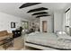 Spacious main bedroom with beamed ceilings and featuring an ensuite bathroom at 1944 Garibaldi Ave, Charlotte, NC 28208