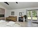 View of main bedroom featuring beamed ceilings and an open door leading to the patio at 1944 Garibaldi Ave, Charlotte, NC 28208