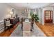 Formal dining room with hardwood floors, chandelier, and elegant decor at 19729 Callaway Hills Ln, Davidson, NC 28036