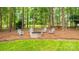 Outdoor fire pit area with seating, perfect for entertaining or enjoying a cozy evening at 19729 Callaway Hills Ln, Davidson, NC 28036