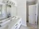Bathroom with dual sinks, large mirror, and combination tub and shower at 2405 Kalis Pl, Charlotte, NC 28262