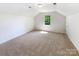 Spacious bedroom with carpet and sunlit window at 2405 Kalis Pl, Charlotte, NC 28262