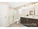 Modern bathroom with double vanities, glass-enclosed shower, and contemporary finishes at 2414 Morgan Hills Dr # 296P, Albemarle, NC 28001