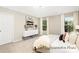 Bright bedroom with large windows allowing natural light and a neutral decor at 2414 Morgan Hills Dr # 296P, Albemarle, NC 28001