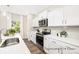 Well-equipped kitchen featuring stainless steel appliances, sleek countertops, and ample cabinet space at 2414 Morgan Hills Dr # 296P, Albemarle, NC 28001