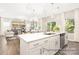 Open concept living area, featuring hardwood floors, modern decor, and lots of natural light at 2414 Morgan Hills Dr # 296P, Albemarle, NC 28001