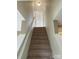 Carpeted staircase leading to the next floor at 2440 Mint Thistle Ct, Charlotte, NC 28269