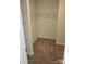 Empty walk-in closet with ample storage space to organize clothes and accessories at 2440 Mint Thistle Ct, Charlotte, NC 28269