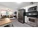 Open kitchen with view to adjacent living room at 2601 Dora Dr, Charlotte, NC 28215