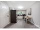 Bright kitchen featuring stainless steel refrigerator and laminate floors at 2601 Dora Dr, Charlotte, NC 28215