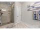 Beautiful bathroom showcasing a tiled shower with glass door and custom shelves at 2704 Watergarden St, York, SC 29745