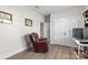 Cozy bedroom showcasing a leather recliner and wood-look flooring at 2704 Watergarden St, York, SC 29745