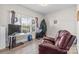 Bedroom featuring a leather recliner and a large window with views of the neighborhood at 2704 Watergarden St, York, SC 29745