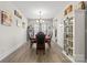 Elegant dining room featuring a chandelier, wine storage, and seating for six, ideal for entertaining guests at 2704 Watergarden St, York, SC 29745