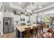 Open kitchen with island, stainless steel appliances, and seamless access to the office area at 2704 Watergarden St, York, SC 29745