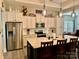 Well-lit kitchen with an island, stainless steel appliances, and pendant lighting at 2704 Watergarden St, York, SC 29745
