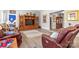 Comfortable living room area with a large entertainment center and inviting furniture for relaxation at 2704 Watergarden St, York, SC 29745