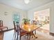 Cozy dining room featuring hardwood floors, natural light, and stylish decor at 301 Glen Oaks Rd, Charlotte, NC 28270