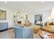 Comfortable living room featuring a fireplace, soft lighting, and stylish furniture at 301 Glen Oaks Rd, Charlotte, NC 28270