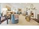 Spacious living room featuring a fireplace, stylish decor, and ample seating at 301 Glen Oaks Rd, Charlotte, NC 28270