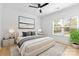 The spacious bedroom features a bright, white, airy atmosphere, perfect for relaxation and rest at 3256 Brixton Ct, Charlotte, NC 28205