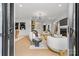 Bright and open living room with modern furniture, a fireplace, and plenty of natural light at 3256 Brixton Ct, Charlotte, NC 28205