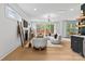 Comfortable living room with a fireplace, modern decor, and ample seating at 3256 Brixton Ct, Charlotte, NC 28205