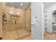 The stand-alone shower features elegant wood panels and sleek black fixtures at 3256 Brixton Ct, Charlotte, NC 28205