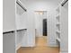 Spacious walk-in closet with custom shelving, providing ample storage and organization at 3256 Brixton Ct, Charlotte, NC 28205