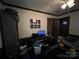 The bedroom features playful decor and an open door leading to the rest of the home at 33611 Mann Rd, Albemarle, NC 28001